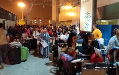 <p><strong>BACK HOME. </strong>Overseas Filipino workers who availed of the amnesty program of the Kuwaiti government arrived in the country on board Qatar Airways flight QR 934 on April 17, 2018. <em>(Photo courtesy of DFA)</em></p>
